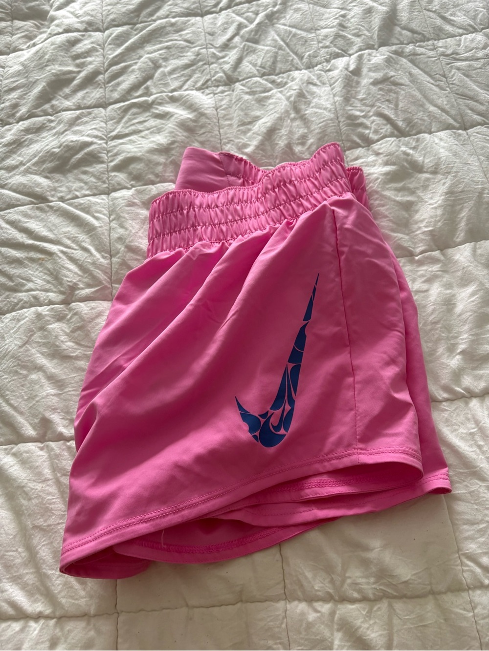 Nike Pink Running Shorts with Blue Swoosh